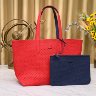 Lacoste red navy tote bag showing the red perforated side